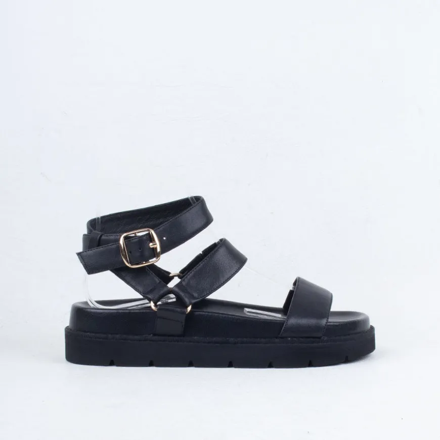 Nomi Sandal^Ernest Wyler New