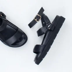 Nomi Sandal^Ernest Wyler New