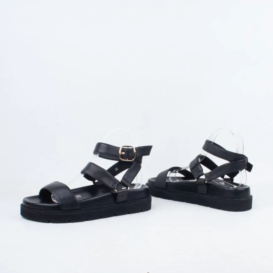 Nomi Sandal^Ernest Wyler New