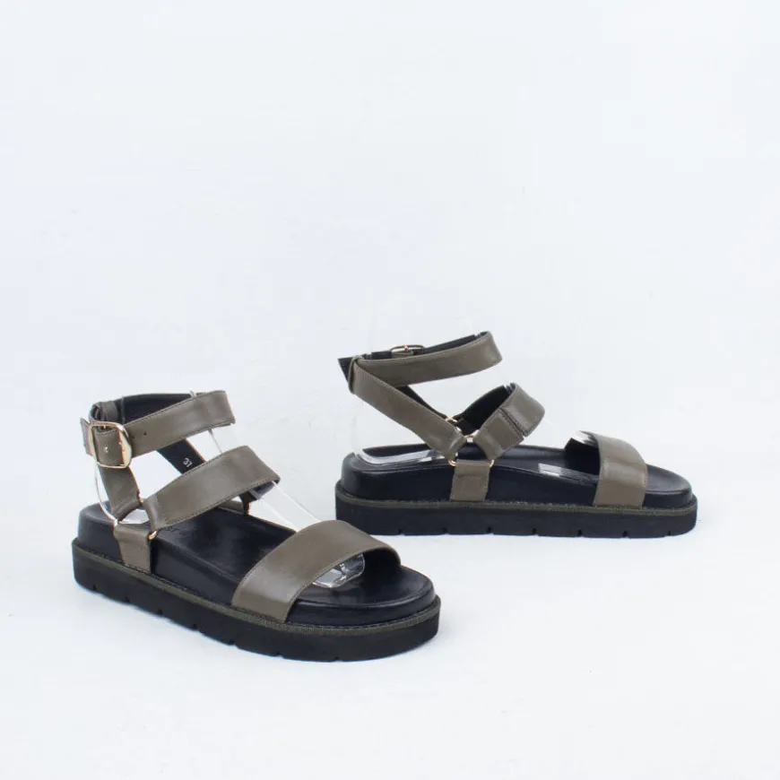 Nomi Sandal^Ernest Wyler New