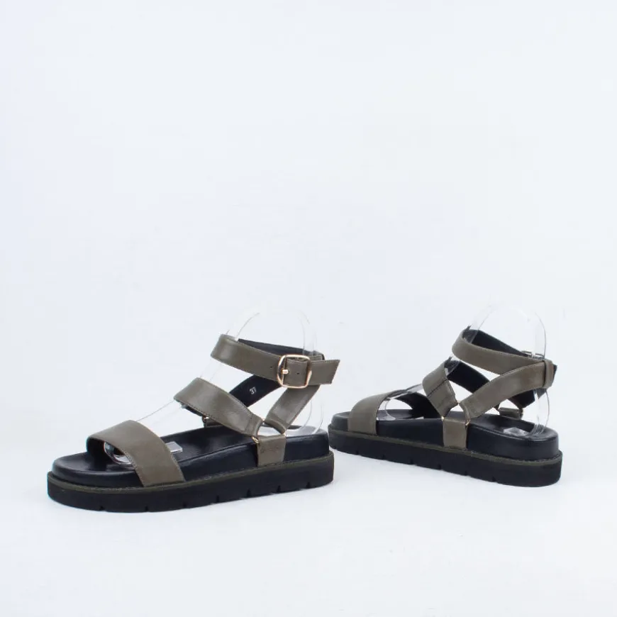 Nomi Sandal^Ernest Wyler New